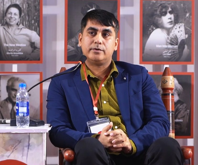 Abbas Korejo speaking on a literary panel discussion